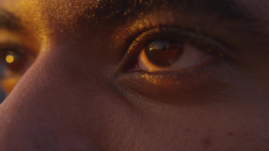 A person opens their eyes and looks up