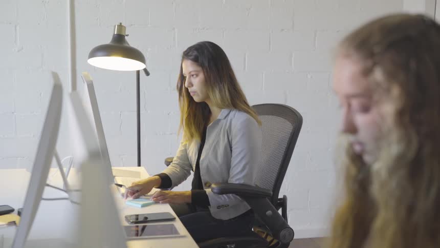 Women are typing on computers