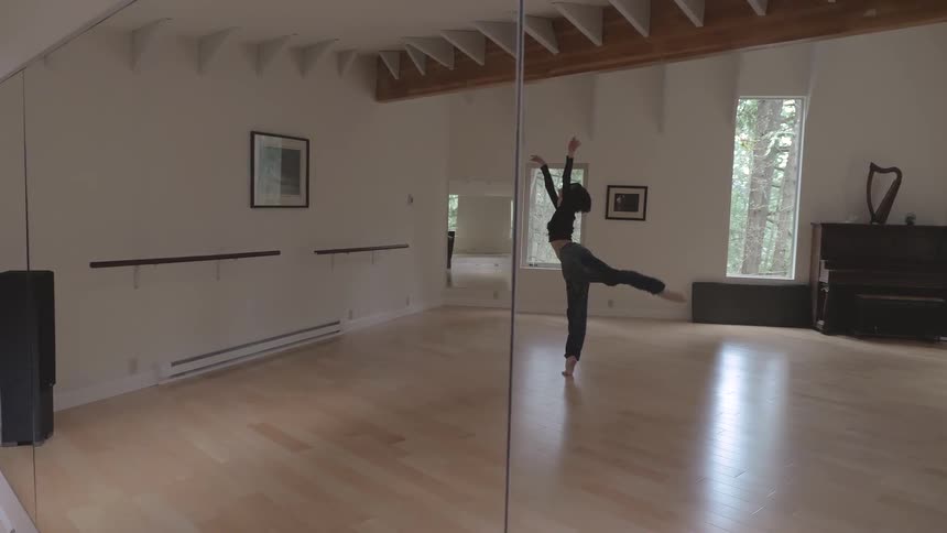 Woman dances in dance studio