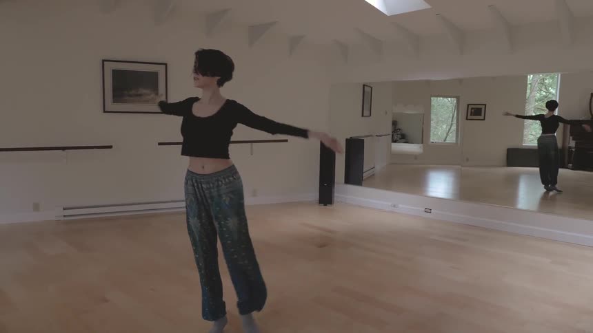Woman dances in dance studio