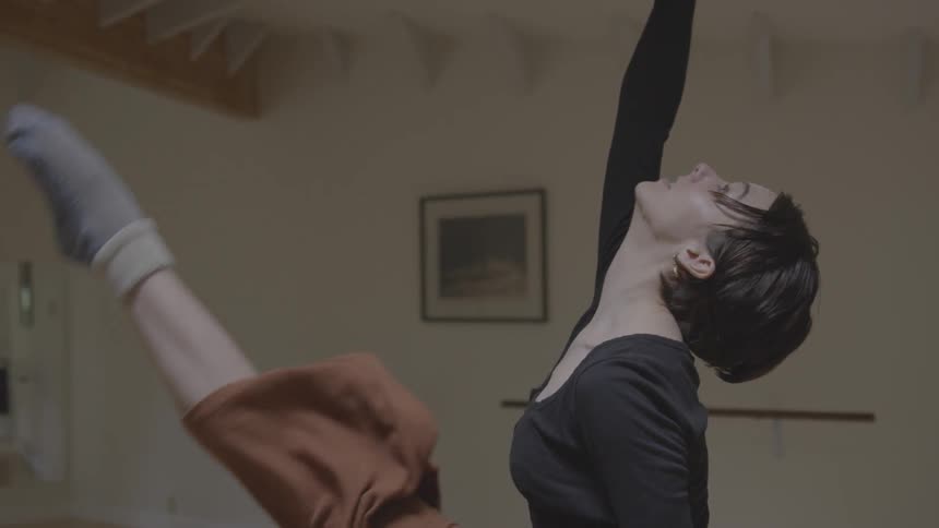 A young woman dances