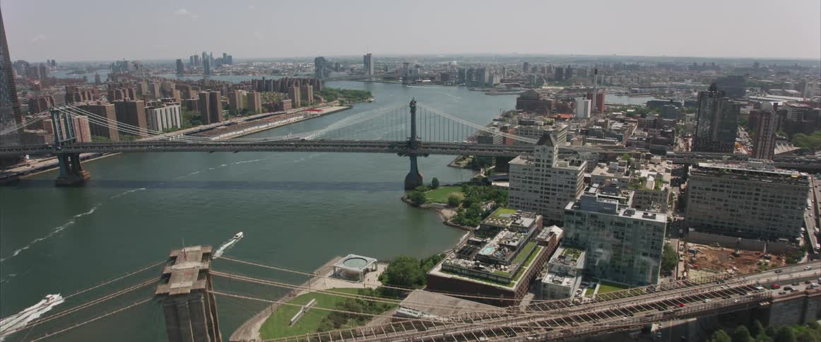 An aerial view of a city by the river