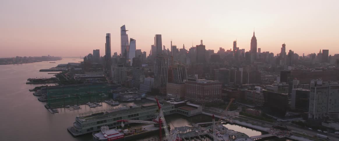 Sunsets behind downtown skyscrapers