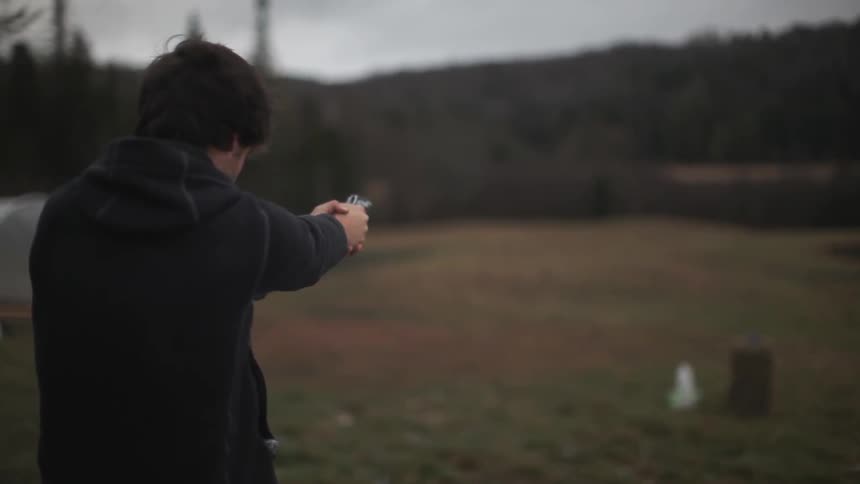 A person holding a gun