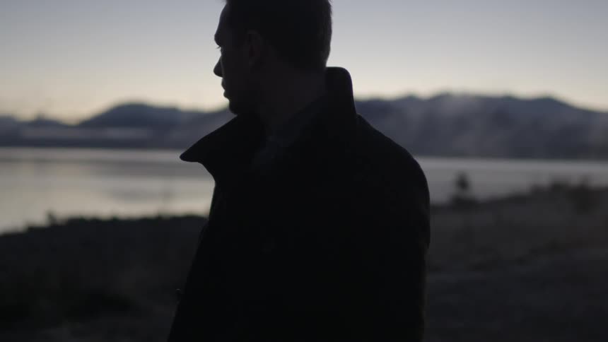 A person looking over their shoulder