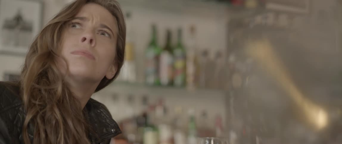 Woman in bar talking