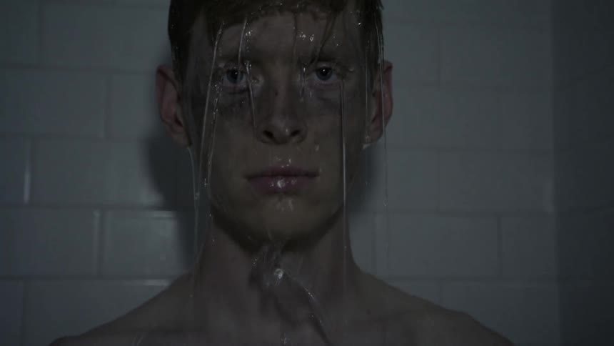 A person standing in a shower
