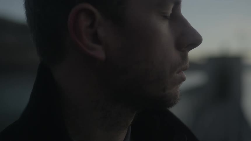 The man closes his eyes