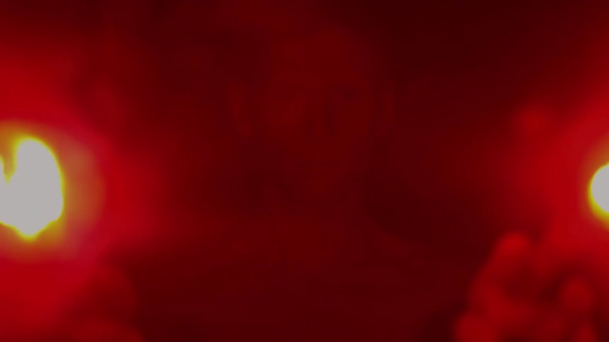 A person holding flares