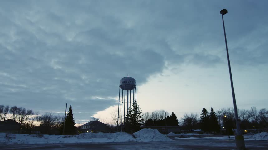 Town water tower in winter