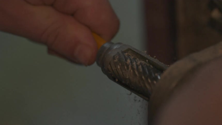Person sharpening a pencil