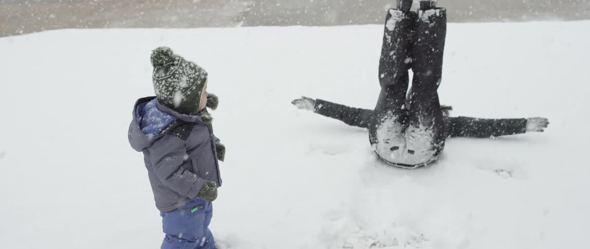 People falling downing in the snow