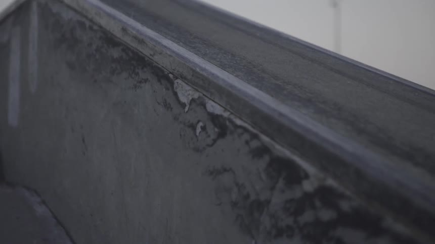 Concrete stairs with a wall on a cloudy day