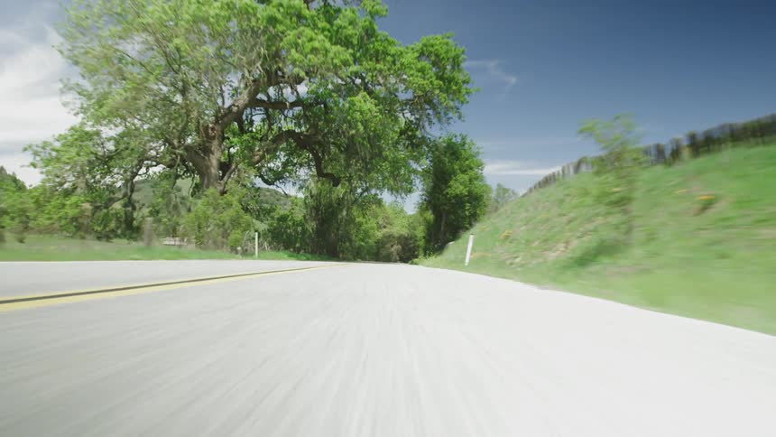 The road has trees around it