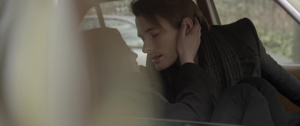 A person sitting in a car