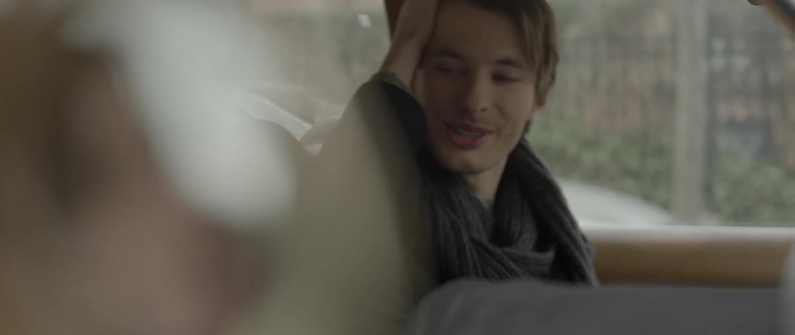 A couple sitting inside of a car