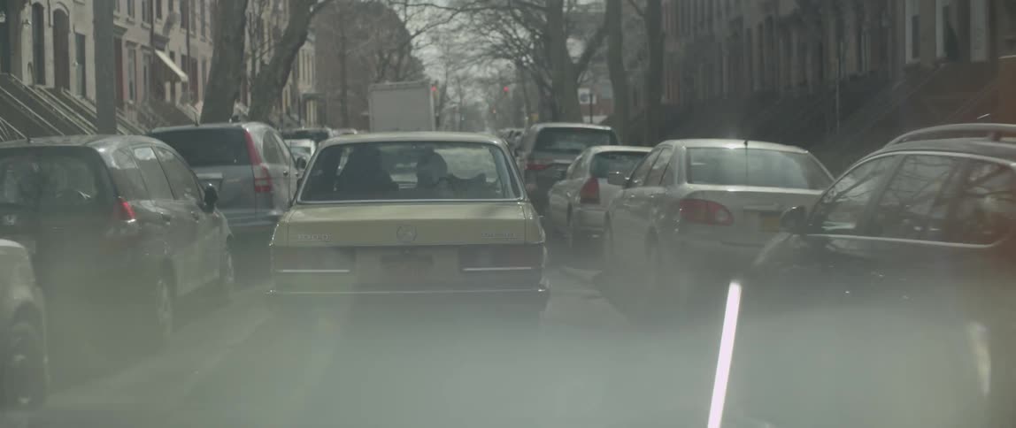 A person driving a car