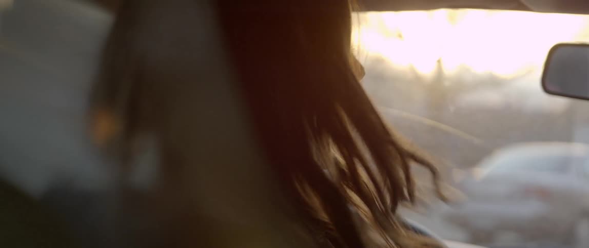 A person sitting in a car