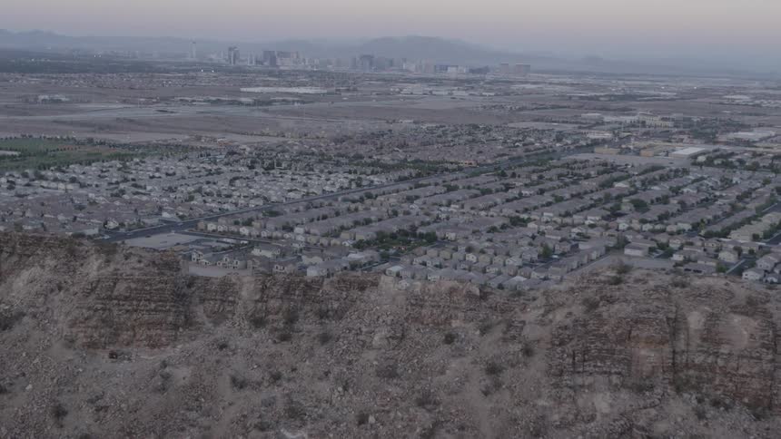 A city looms in the distance