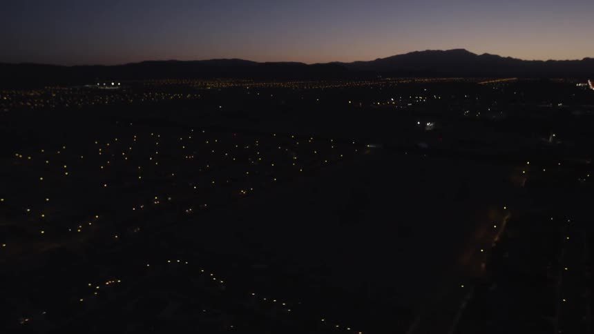 A city is seen from above at night