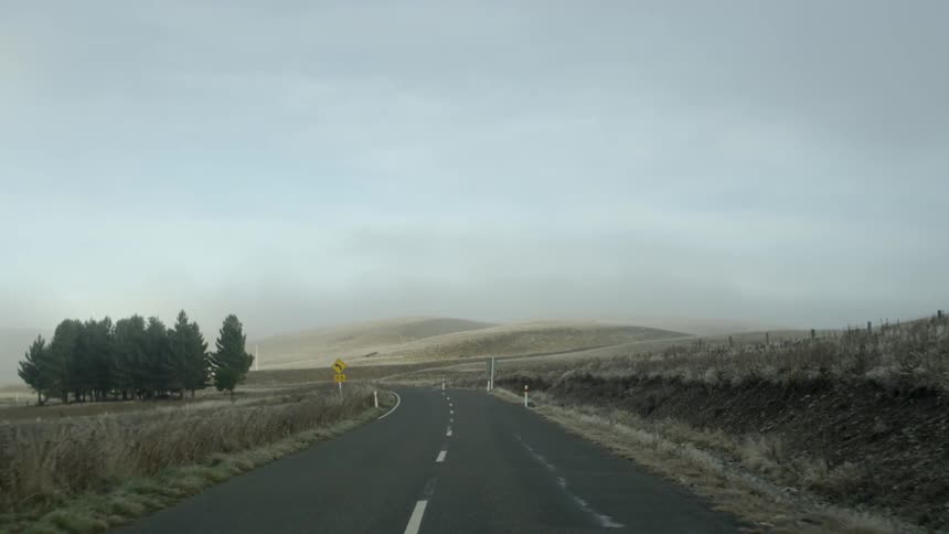Driving down a two lane highway