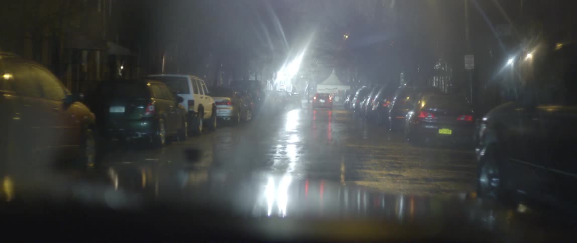 A person driving in the rain