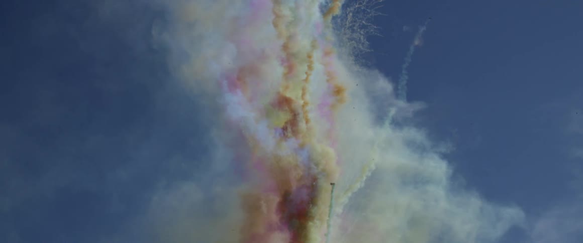 Cloud with colored smoke flying upwards
