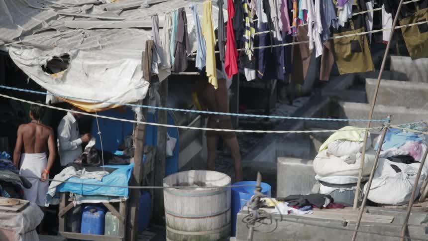 People in slums during the day