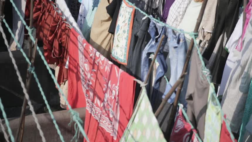 Bright clothes drying on a laundry line