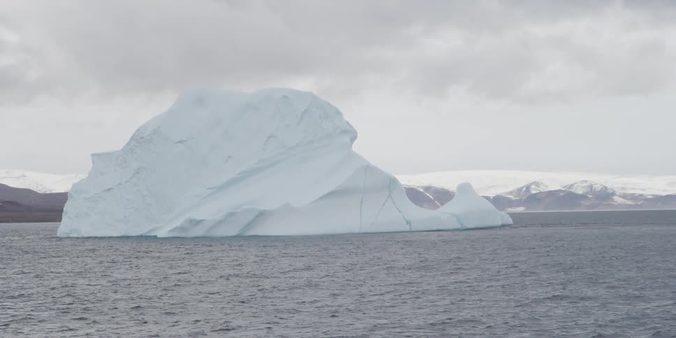 Large piece of ice protruding from a cold sea