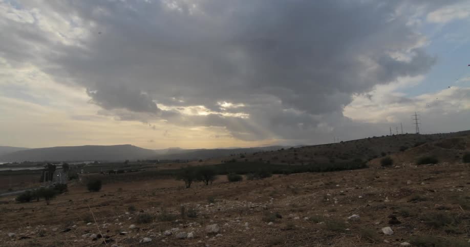 Clouds float over a desert