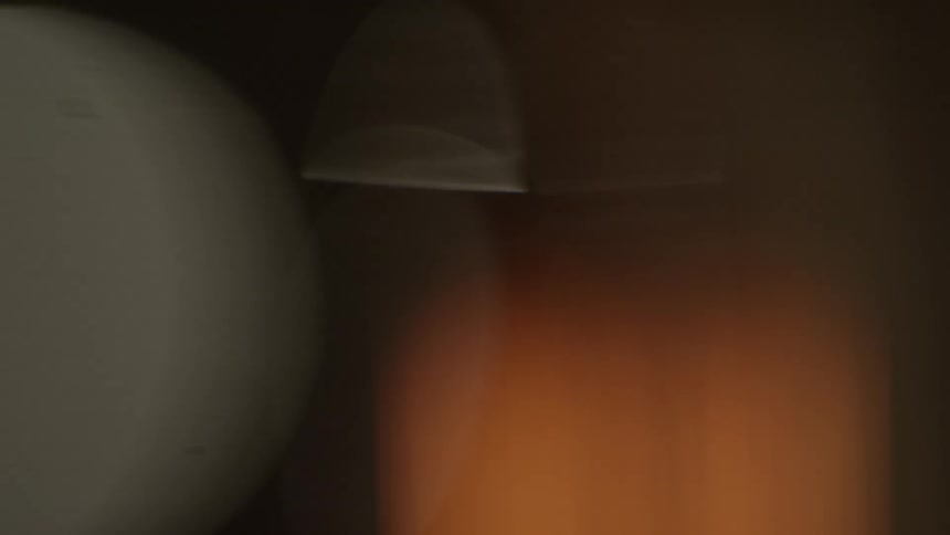 An orange light blinking in the background