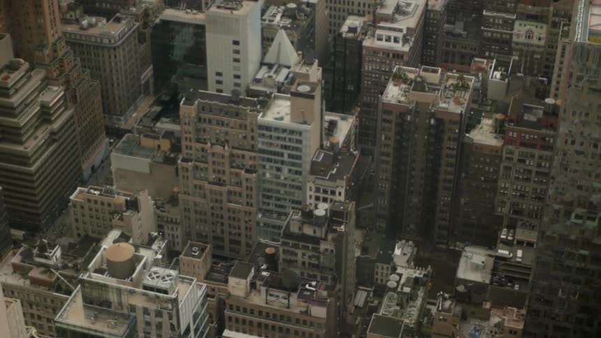 An aerial view of a city's tall buildings