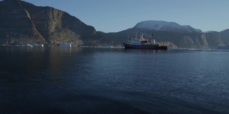 A large boat sitting out in the water