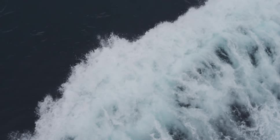 Waves crashing and foaming