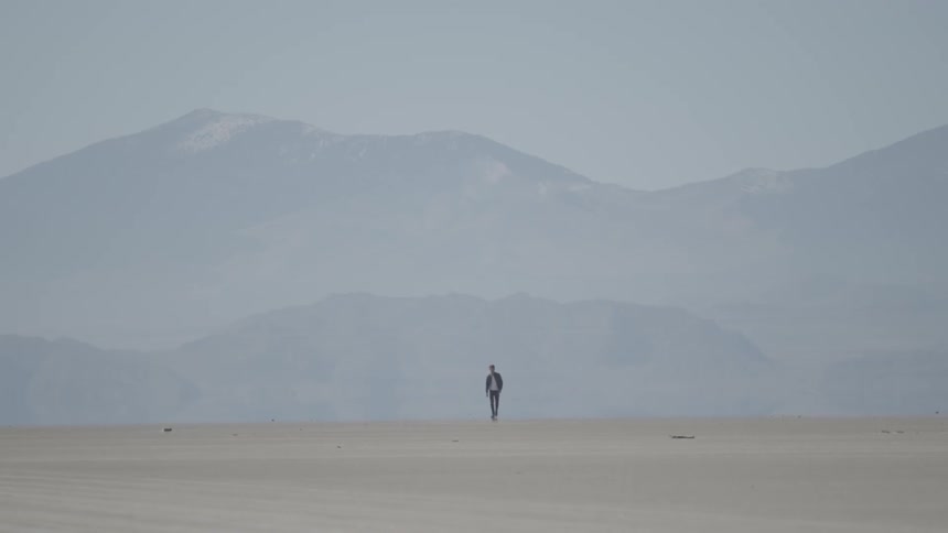 A man walking through a lonely deserted area