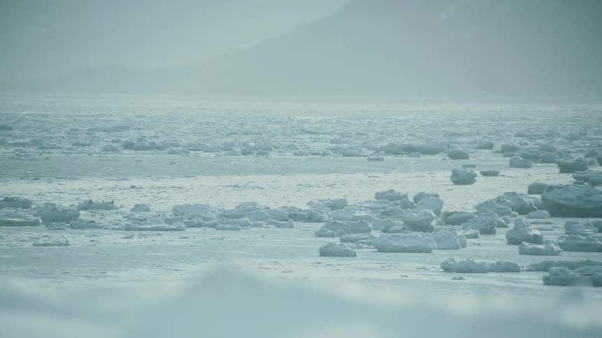 Ice and frozen water move in a current