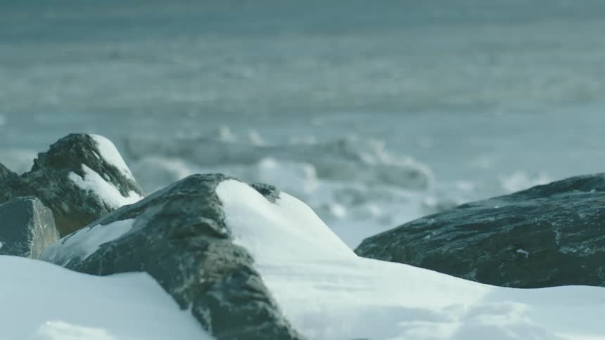 Ice melts drift down water