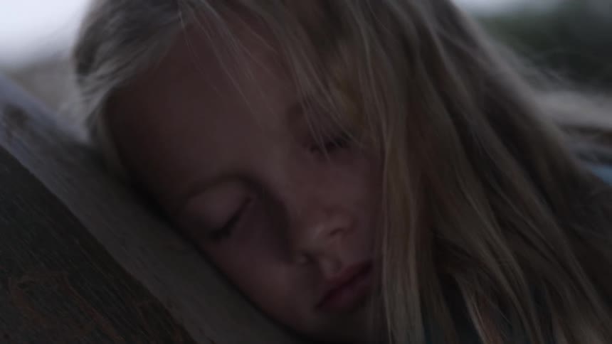 A little blond girl sleeping