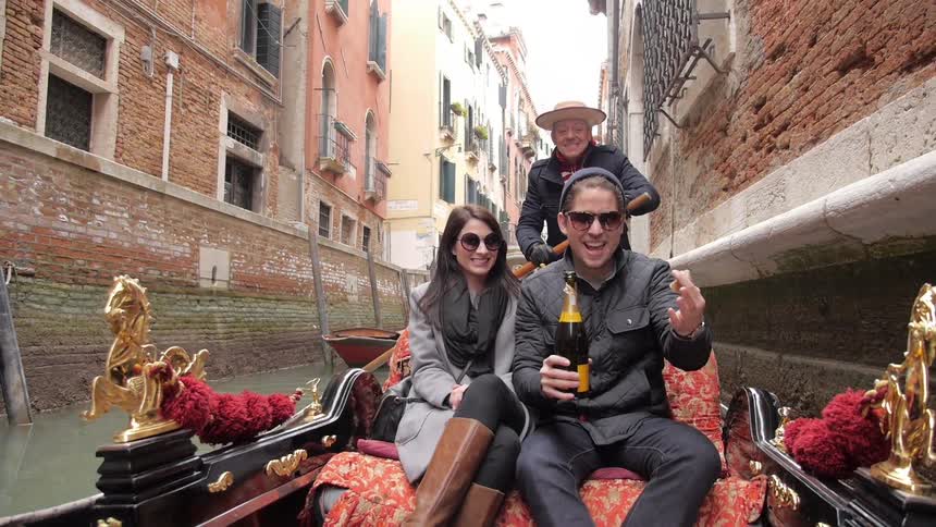 A couple riding on a gondola