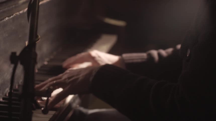 Older man plays the piano