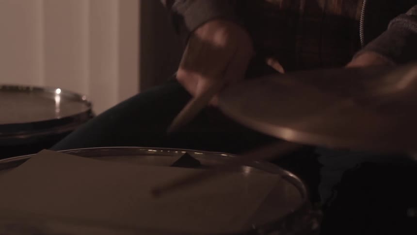 Someone playing the drums