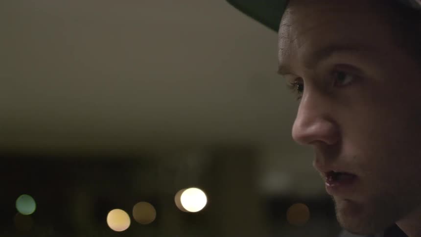 A person in a red hat looking at something