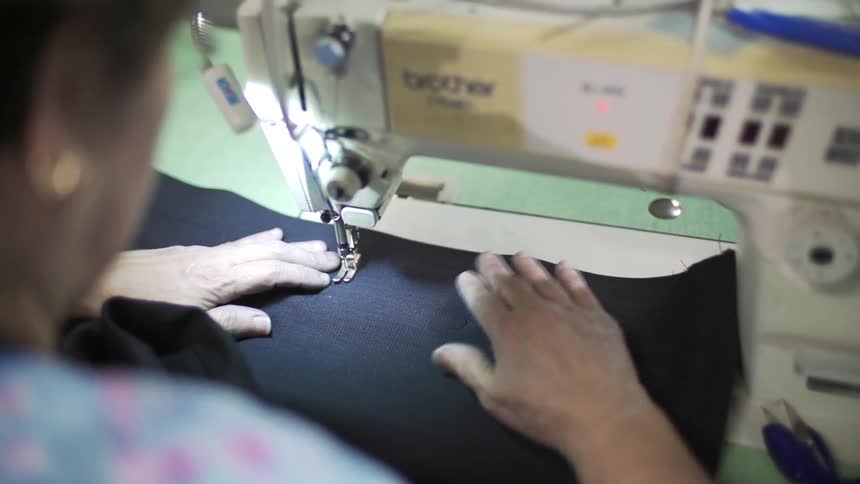 Someone using a sewing machine