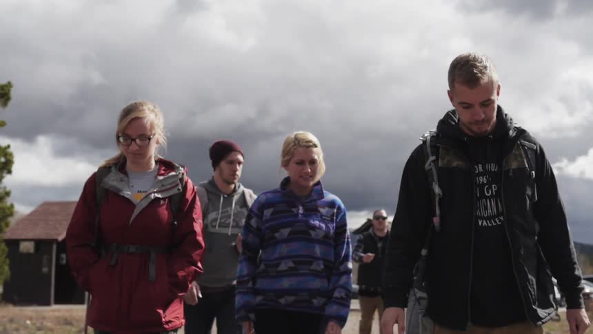 Group of people walking together outside