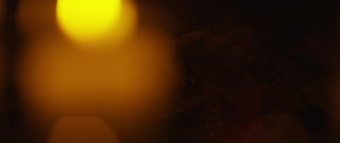 Blurry lights flickering in a dark room