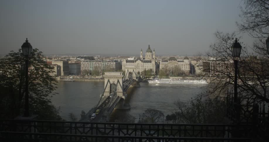 Traffic crossing a bridge over a large river