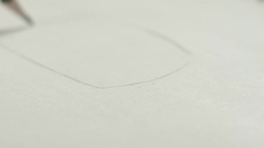 A woman uses a pencil to make a sketch