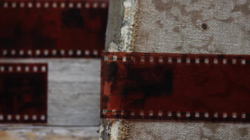 Film negatives on a wooden table