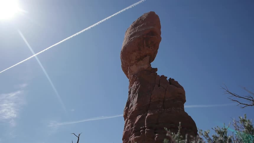 Interesting rock formation juts into blue sky
